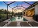 Inviting screened-in pool area with lounge chairs and outdoor seating at 17424 Cresswind Ter, Bradenton, FL 34211
