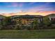 Private screened-in pool and patio area at sunset at 17424 Cresswind Ter, Bradenton, FL 34211