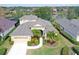 Two-story house with lake view and nicely landscaped yard at 6476 Royal Tern Cir, Lakewood Ranch, FL 34202