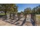 Dog park with separate entrance and exit gates at 6476 Royal Tern Cir, Lakewood Ranch, FL 34202