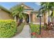 Inviting front entrance with landscaping and a walkway at 6476 Royal Tern Cir, Lakewood Ranch, FL 34202