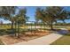 Playground with swings and play structures at 6476 Royal Tern Cir, Lakewood Ranch, FL 34202