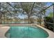 Enclosed pool area with lake view at 6476 Royal Tern Cir, Lakewood Ranch, FL 34202