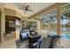Inviting screened-in pool and patio area with lake view at 6476 Royal Tern Cir, Lakewood Ranch, FL 34202