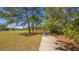 Paved walking trail through lush landscaping at 6476 Royal Tern Cir, Lakewood Ranch, FL 34202