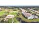 Community overview showcasing golf course and water views at 6609 Stone River Rd # 104, Bradenton, FL 34203