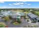Aerial view of Tara Golf & Country Club clubhouse and grounds at 6609 Stone River Rd # 104, Bradenton, FL 34203