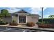 Community building with accessible entrance and landscaping at 6609 Stone River Rd # 104, Bradenton, FL 34203