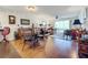 Bright dining area with wood floors and seating for four at 6609 Stone River Rd # 104, Bradenton, FL 34203