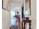 Bright entryway with hardwood floors and decorative accents at 6609 Stone River Rd # 104, Bradenton, FL 34203