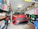 Spacious garage with storage shelving and room for a car at 6609 Stone River Rd # 104, Bradenton, FL 34203
