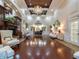 Elegant lobby with hardwood floors, fireplace, and comfortable seating at 6609 Stone River Rd # 104, Bradenton, FL 34203