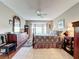 Spacious main bedroom with bay windows, plush carpeting, and lots of natural light at 6609 Stone River Rd # 104, Bradenton, FL 34203