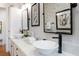 Modern bathroom with double sinks and mosaic tile at 1923 Hibiscus St, Sarasota, FL 34239