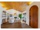 Elegant entryway with arched doorway and hardwood floors at 1923 Hibiscus St, Sarasota, FL 34239