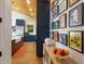 Hallway with gallery wall and built-in shelving at 1923 Hibiscus St, Sarasota, FL 34239