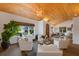 Light-filled living room featuring hardwood floors and stylish seating at 1923 Hibiscus St, Sarasota, FL 34239