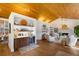 Modern wet bar with wood cabinetry and wine cooler at 1923 Hibiscus St, Sarasota, FL 34239