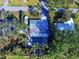 Overhead view of the house and lush landscaping at 315 Palmetto W Rd, Nokomis, FL 34275