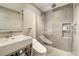 Modern bathroom with a glass shower and a toilet at 315 Palmetto W Rd, Nokomis, FL 34275