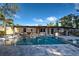 Stunning pool and spa with outdoor seating and a covered patio area at 315 Palmetto W Rd, Nokomis, FL 34275