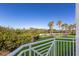 Balcony with scenic view of palm trees and water at 3431 79Th Street W Cir # 102, Bradenton, FL 34209