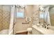 Clean bathroom with shower/tub, vanity, and tile flooring at 3625 Tin Cup Blvd, Sarasota, FL 34232