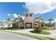 Community clubhouse with palm trees and landscaping at 3625 Tin Cup Blvd, Sarasota, FL 34232