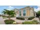 Landscaped exterior with walkway to the entrance of a charming house at 3625 Tin Cup Blvd, Sarasota, FL 34232