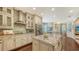 Island kitchen with granite countertops and stainless steel appliances at 3625 Tin Cup Blvd, Sarasota, FL 34232