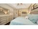 Main bedroom with large dresser and ensuite bathroom access at 3625 Tin Cup Blvd, Sarasota, FL 34232