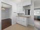 Modern kitchen with white cabinets and granite countertops at 4001 17Th W Ave, Bradenton, FL 34205