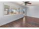 Living area with hardwood floors and access to patio at 4001 17Th W Ave, Bradenton, FL 34205