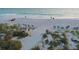 Stunning beach view with white sand and calm ocean waters at 5310 Gulf Of Mexico Dr # 11, Longboat Key, FL 34228