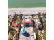 Aerial view of multiple luxury beachfront homes under construction at 5965 Gulf Of Mexico Dr, Longboat Key, FL 34228