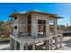 Elevated view of a two-story home under construction with a beachfront location at 5965 Gulf Of Mexico Dr, Longboat Key, FL 34228