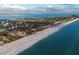 Luxury beachfront homes and pristine beach along coastline at 5965 Gulf Of Mexico Dr, Longboat Key, FL 34228