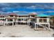 Under-construction luxury beachfront home with expansive water views at 5965 Gulf Of Mexico Dr, Longboat Key, FL 34228