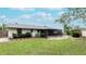 Large backyard with patio, shed, and well-manicured lawn at 6201 34Th W Ave, Bradenton, FL 34209