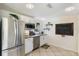 Modern kitchen with stainless steel appliances and white shaker cabinets at 6201 34Th W Ave, Bradenton, FL 34209