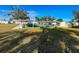 Community shuffleboard court with benches and shelters at 6824 Haawi Ct, North Port, FL 34287