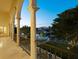 Balcony overlooking the water with arched columns at 749 Freeling Dr, Sarasota, FL 34242