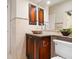 Bathroom with dark wood vanity and a vessel sink at 749 Freeling Dr, Sarasota, FL 34242