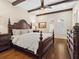 Spacious bedroom with a large bed and wood floors at 749 Freeling Dr, Sarasota, FL 34242