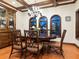 Formal dining room with dark wood table and chairs at 749 Freeling Dr, Sarasota, FL 34242