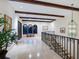 Bright hallway with arched windows and a chandelier at 749 Freeling Dr, Sarasota, FL 34242