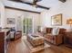 Living Room with brown couch and wood floors at 749 Freeling Dr, Sarasota, FL 34242