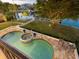 Elevated view of a luxurious pool and spa area at 749 Freeling Dr, Sarasota, FL 34242