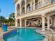 Resort-style pool with spa and expansive patio at 749 Freeling Dr, Sarasota, FL 34242