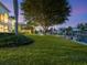 Landscaped waterfront property with private dock and lush lawn at 749 Freeling Dr, Sarasota, FL 34242